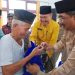 Kunjungi Seberang Kota, Bupati Berikan Bantuan Lansia dan Penyandang Disabilitas
